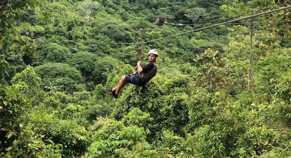 Canopy Tours and Zip-lining: Experience the thrill of flying through the treetops